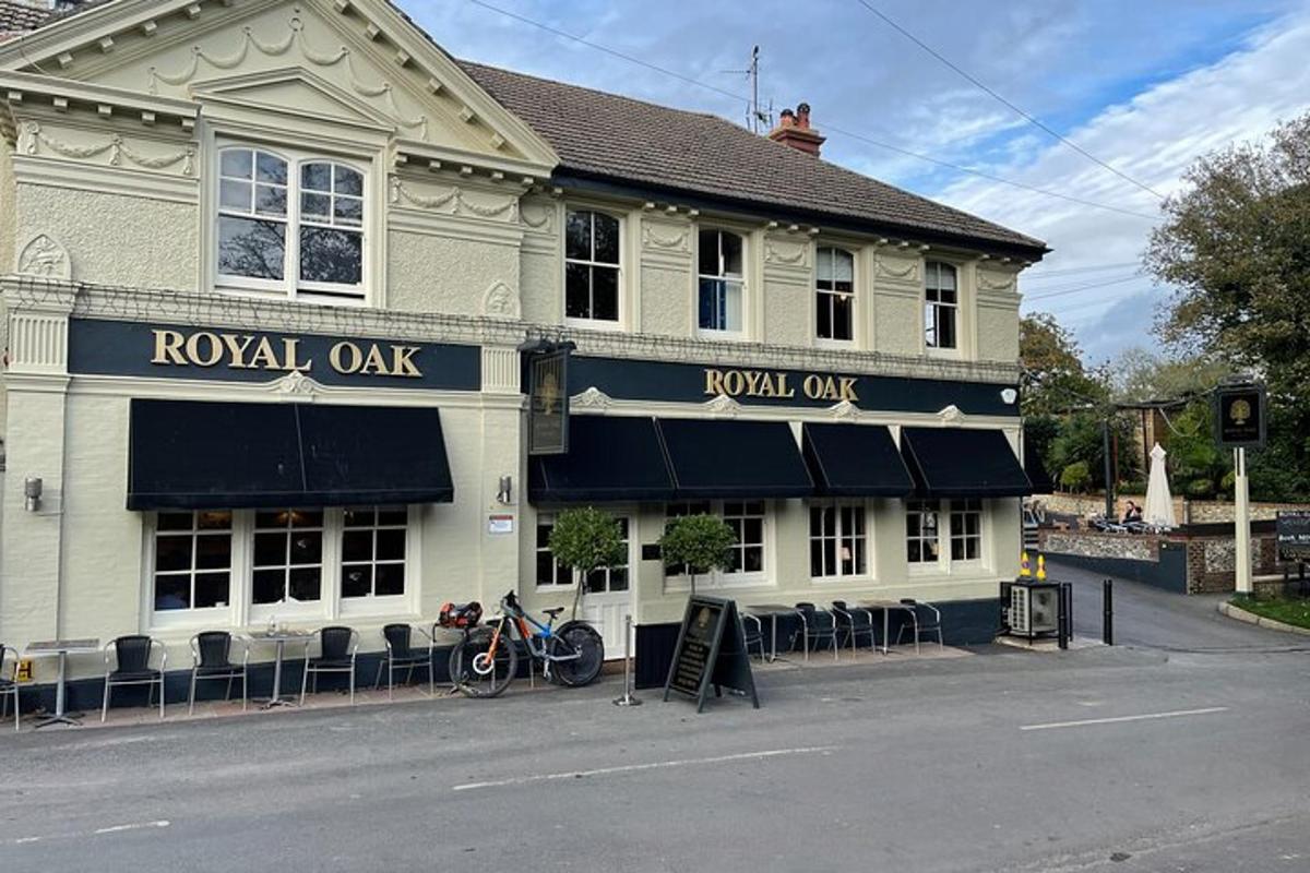 a building with a royal oak sign on a street