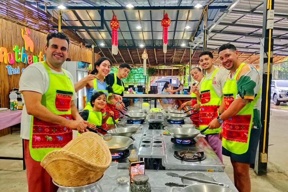 un grup de persones amb armilles grogues preparant menjar