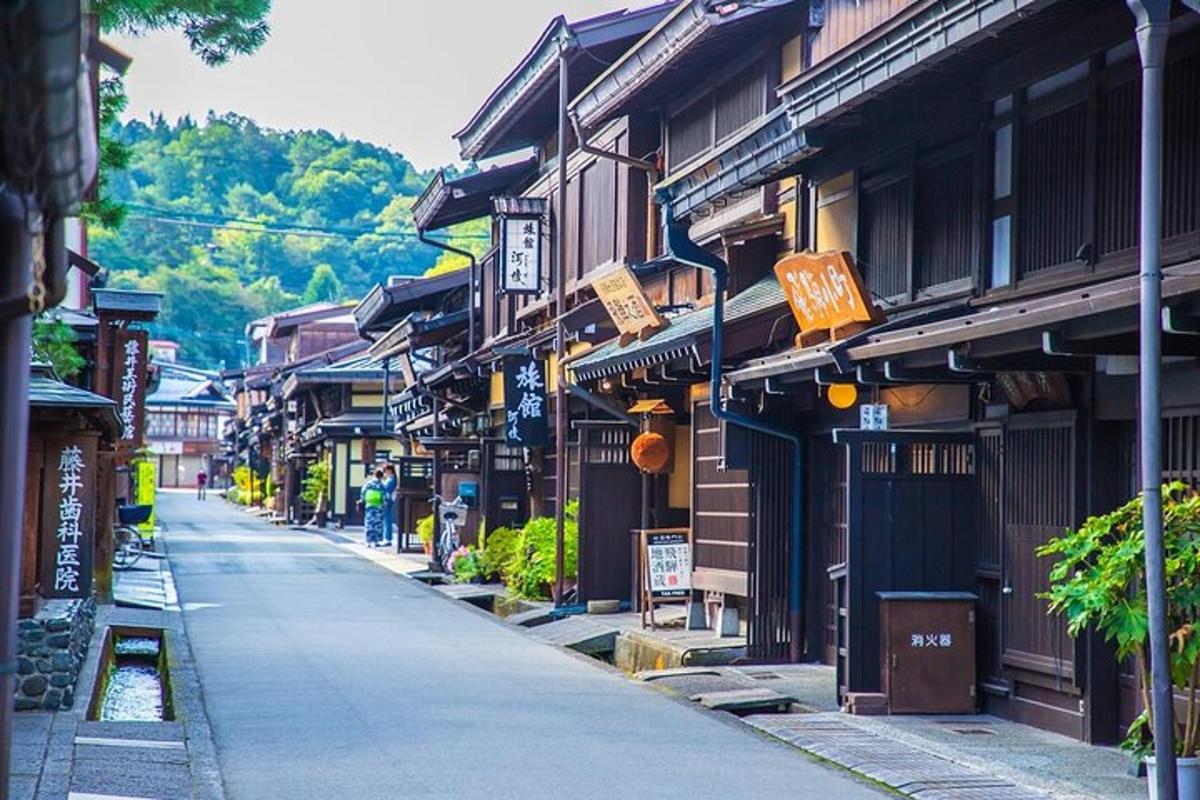 an empty street in an asian town with buildings