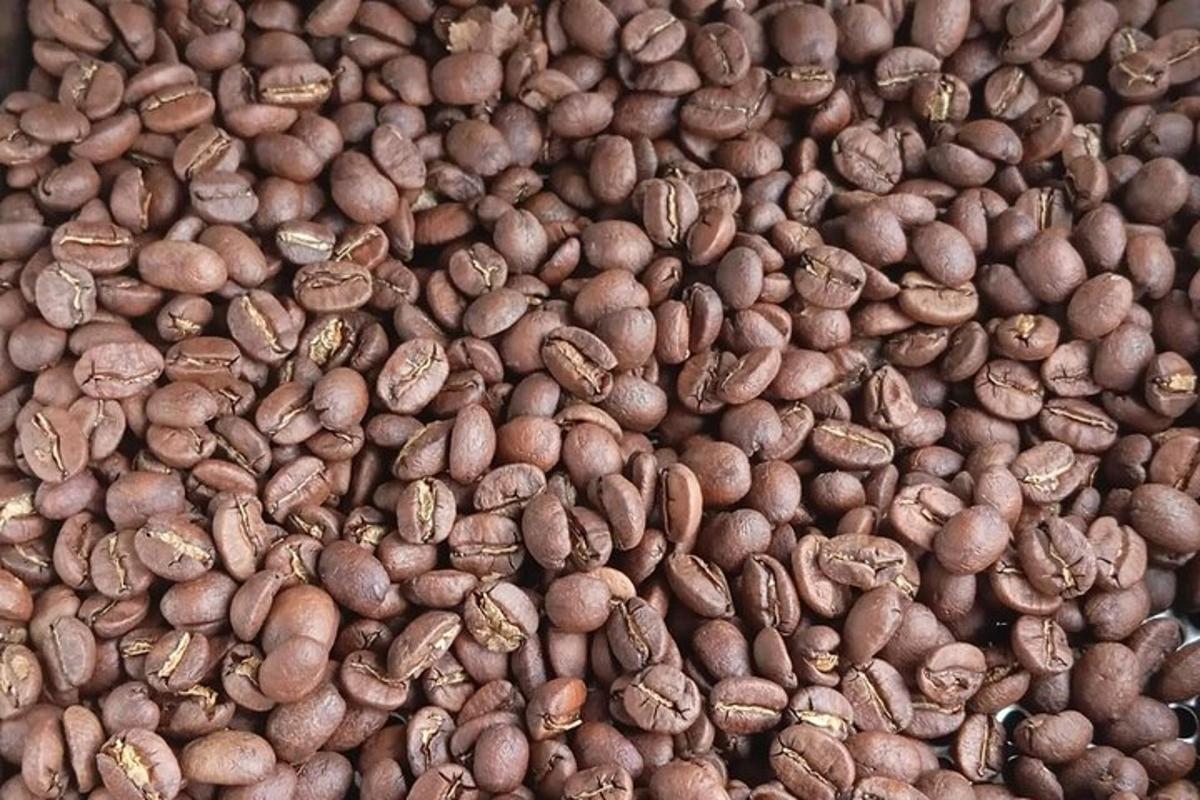 a pile of coffee beans laying on top of each other
