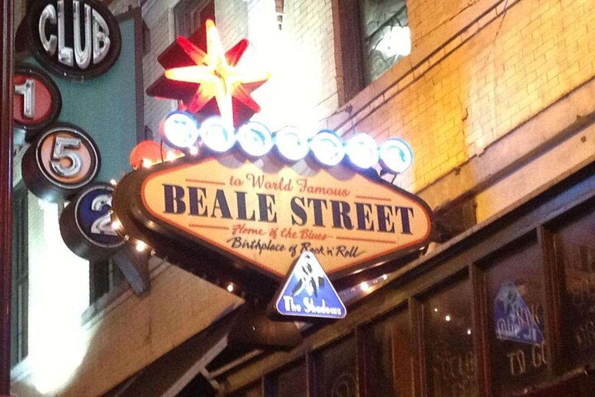 a beale street sign on the side of a building