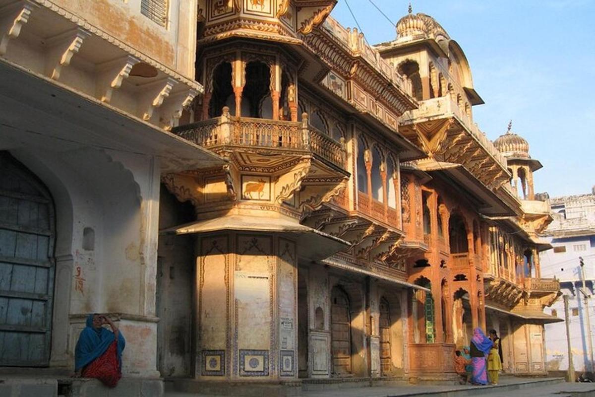 a woman standing in front of a building