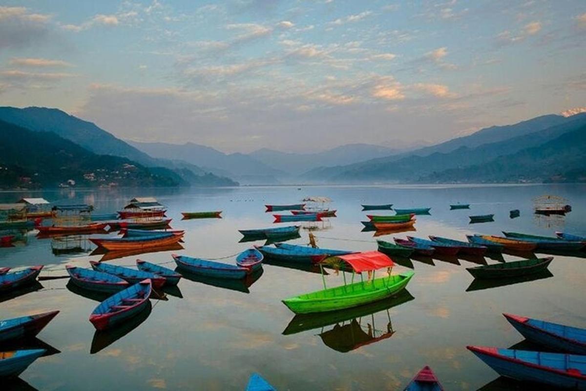a group of boats sitting in the water