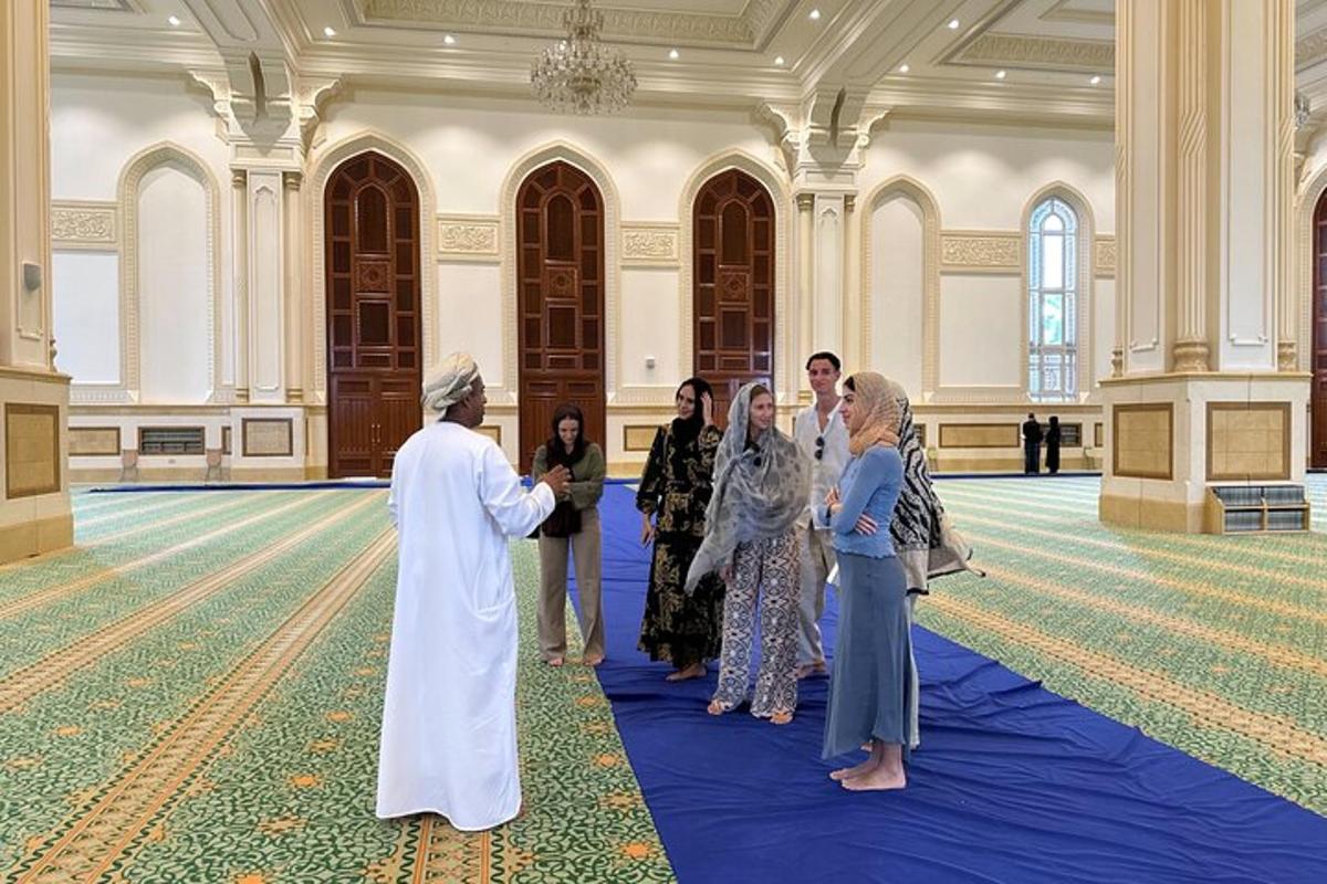 a group of people standing in a room with a pope