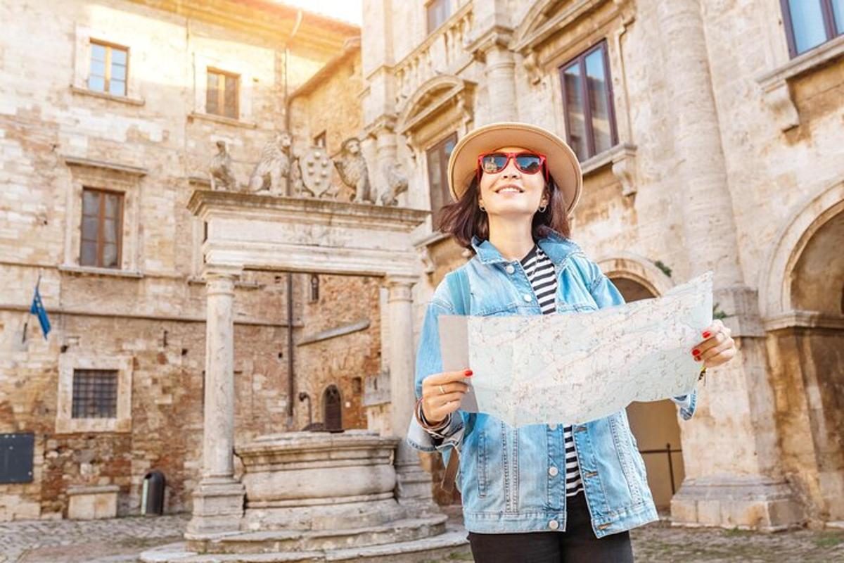 a woman holding a map in front of a building
