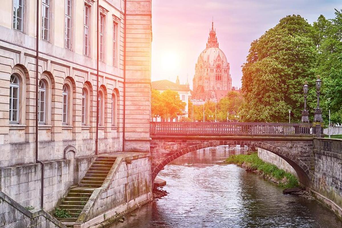 a bridge over a river next to a building