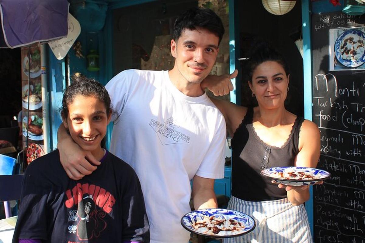 a man and a woman holding plates of food