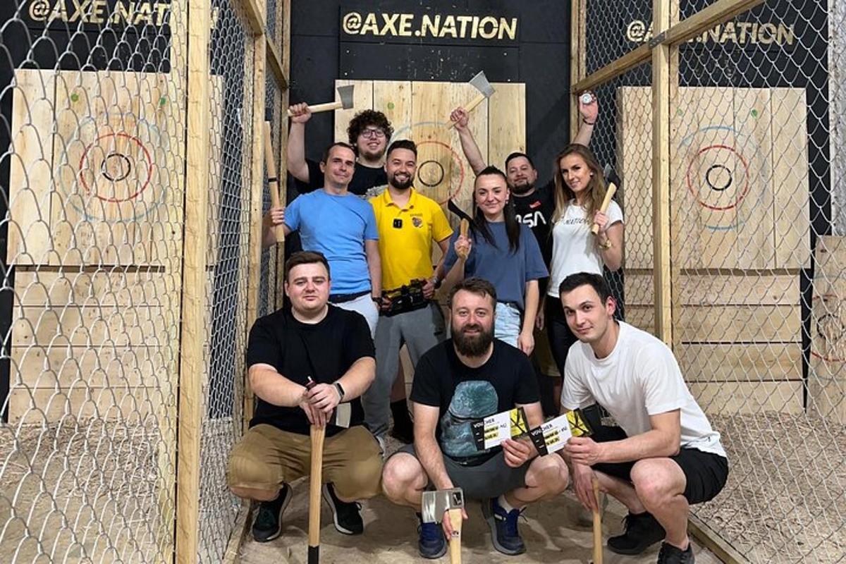 a group of people posing in front of a cage