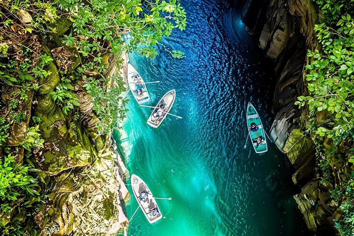 an aerial view of boats in a body of water
