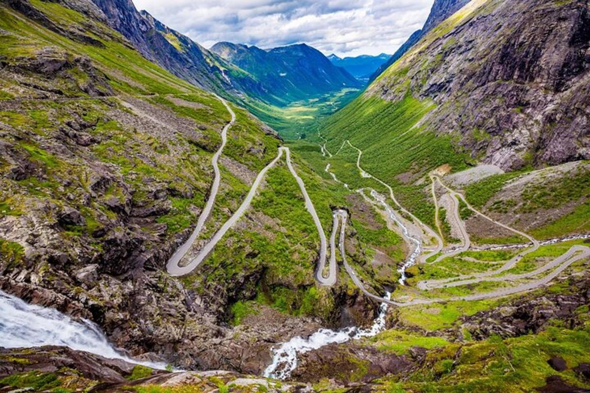 a winding road on the side of a mountain