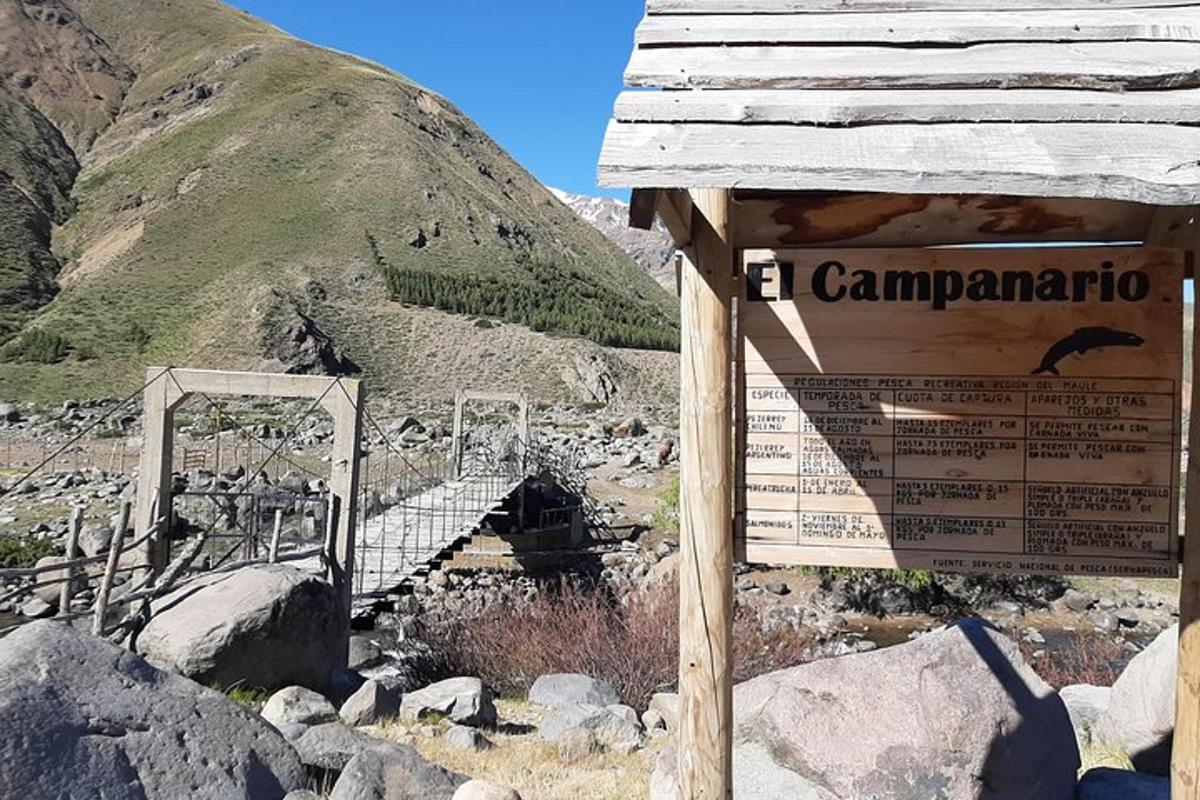 a sign on the side of a mountain