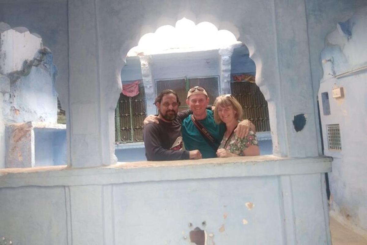 a group of three people standing in a play house