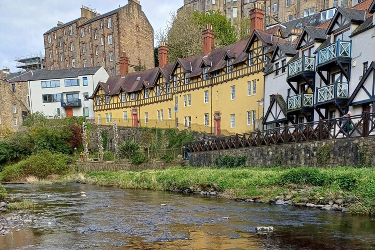 a bridge over a river in a city with buildings