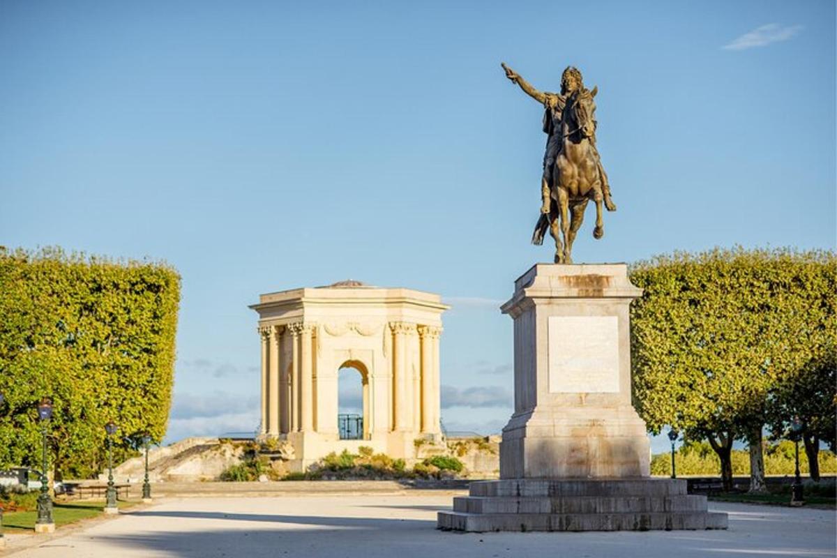 a statue of a man on a horse in front of a building
