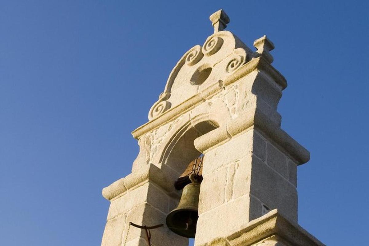a bell on the side of a building