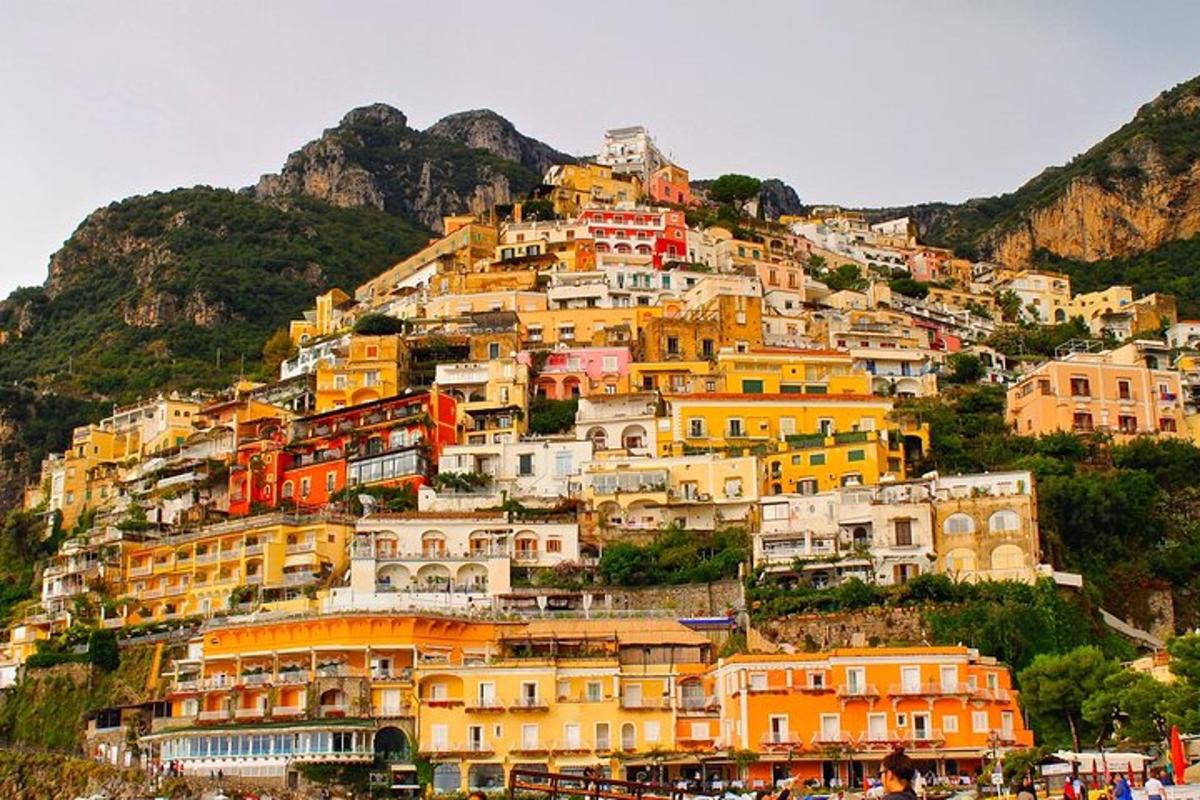 a bunch of houses on a hill with buildings