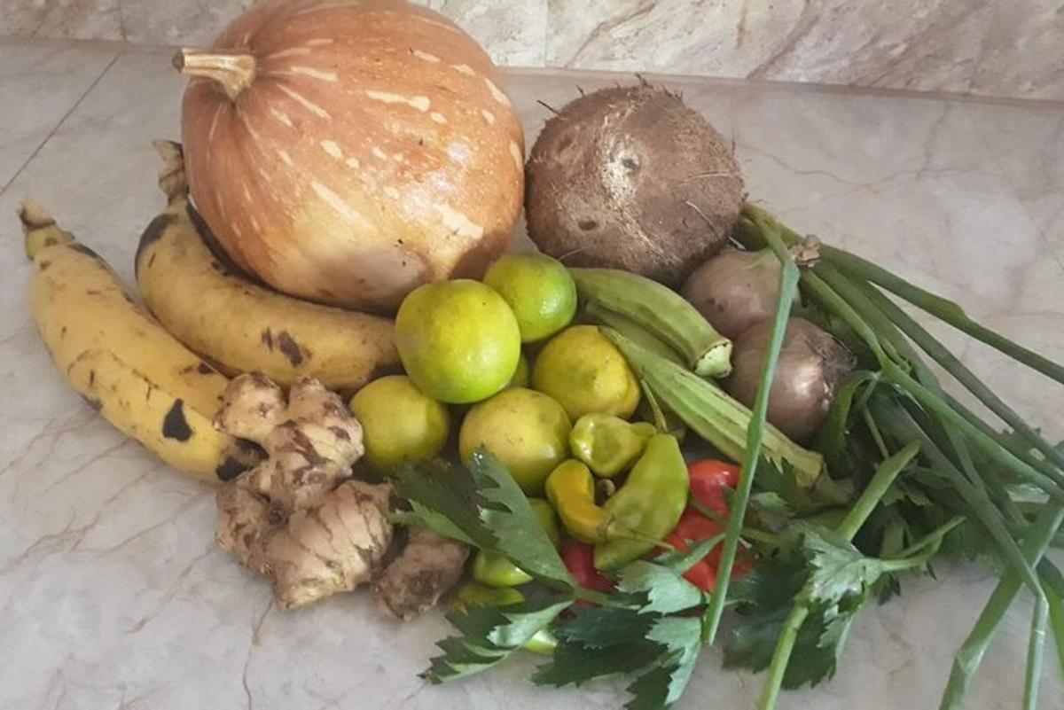 a pile of fruits and vegetables on a table