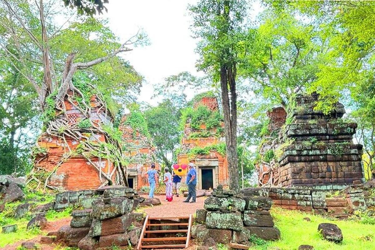 a group of people standing in front of a temple