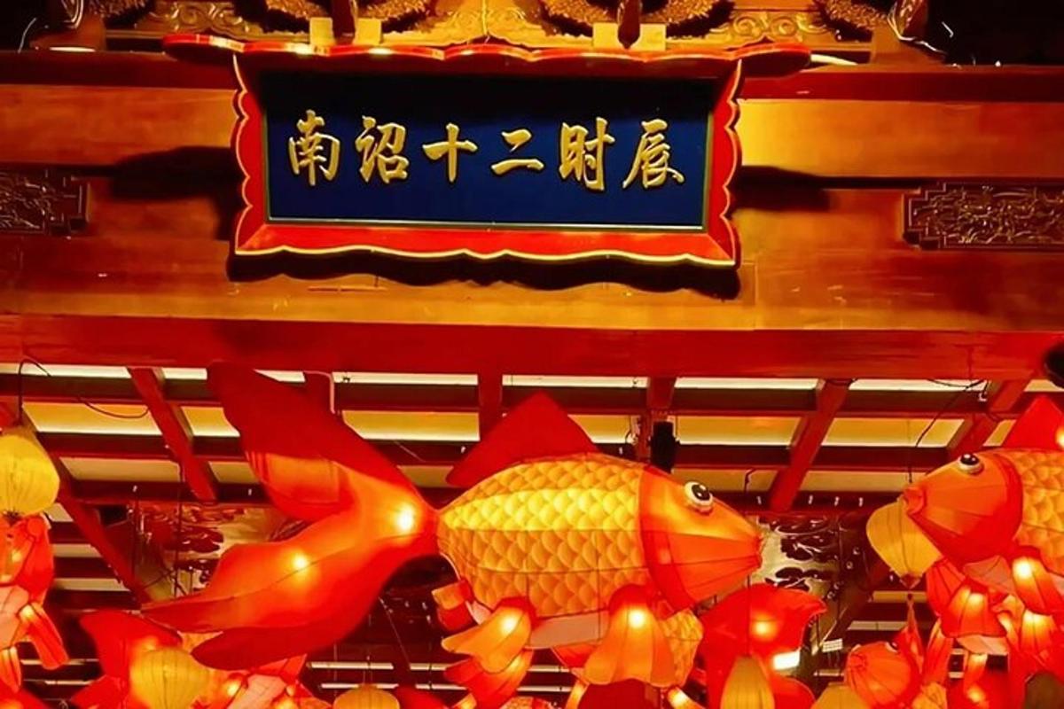 a sign for a restaurant with two orange fish