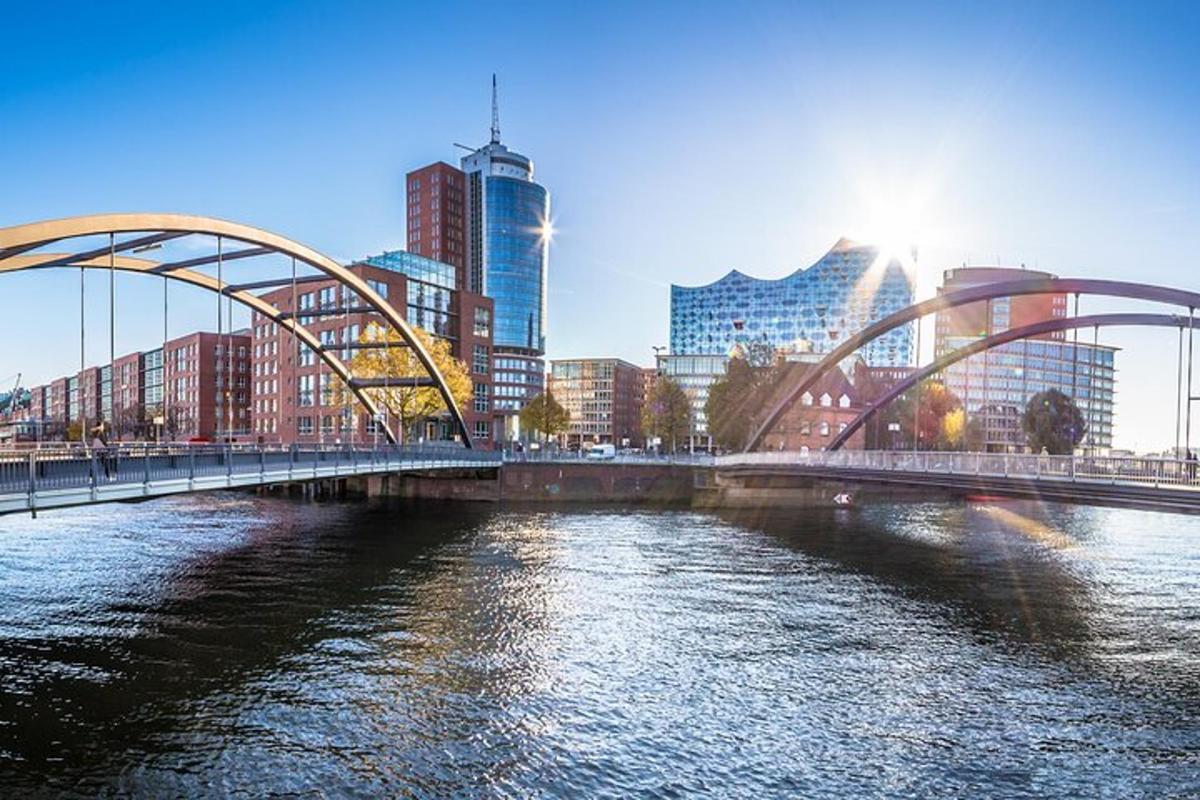 a bridge over a river in a city with buildings