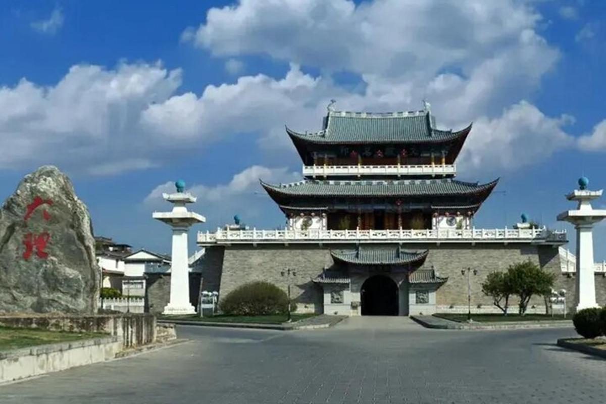 a large building with a gate in front of it