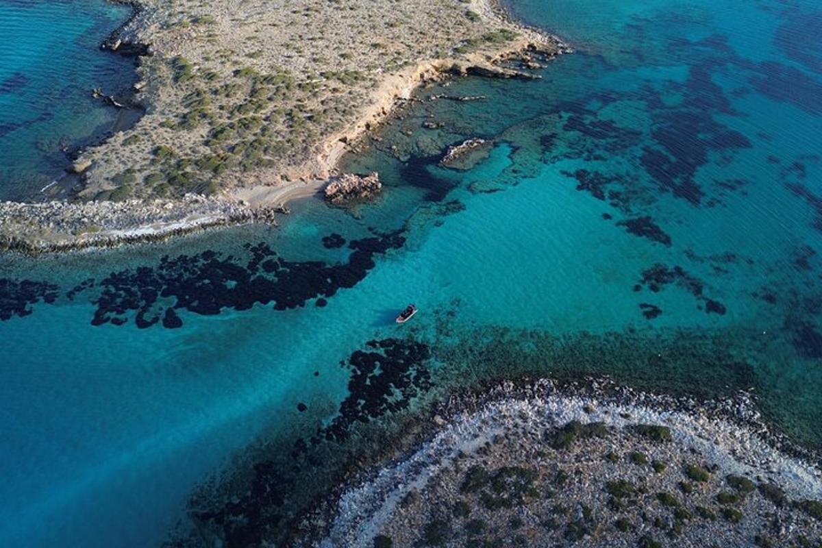 an aerial view of an island in the ocean