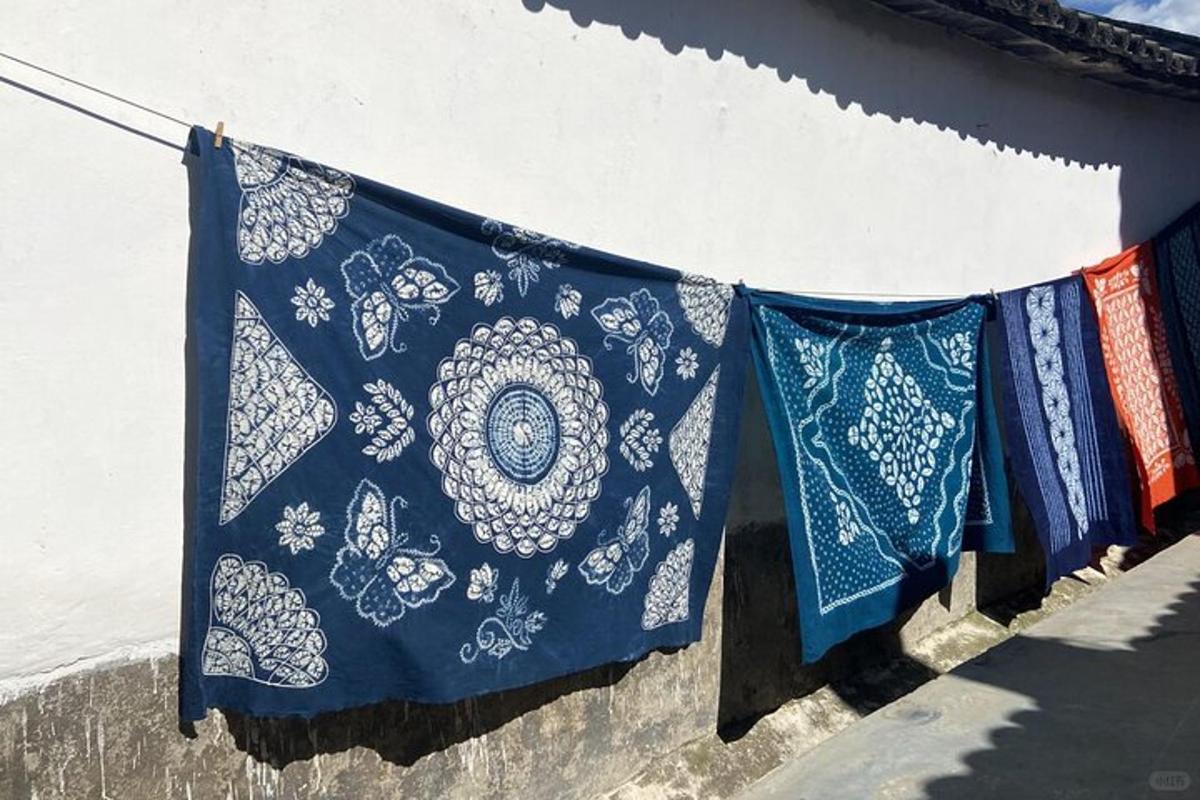 a group of towels hanging on a clothes line