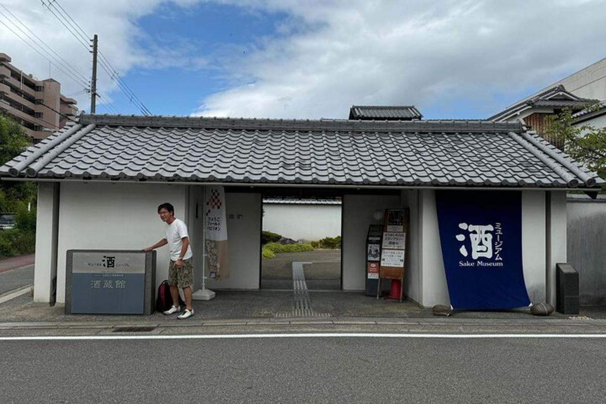 a man standing in front of a building