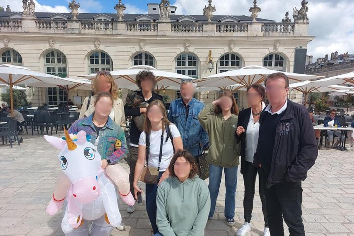 a group of people standing in front of a building