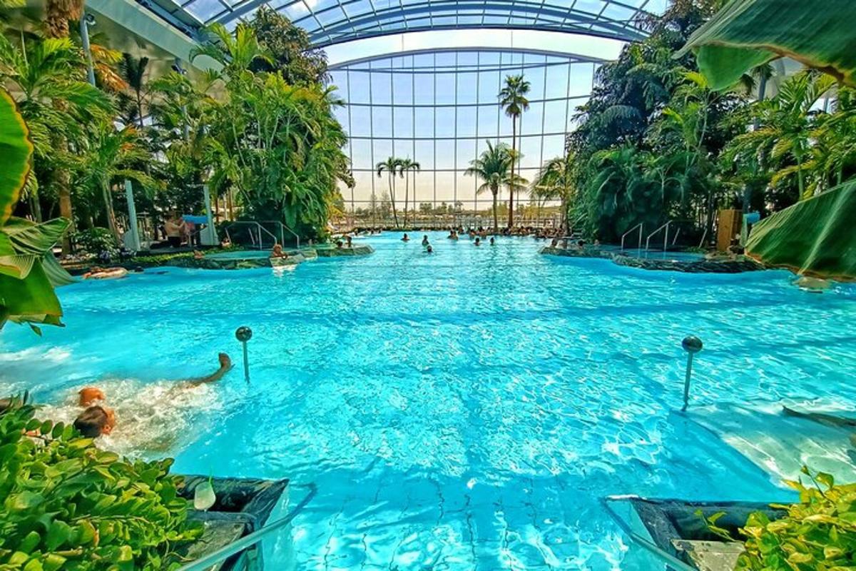 a pool in a mall with people swimming in it