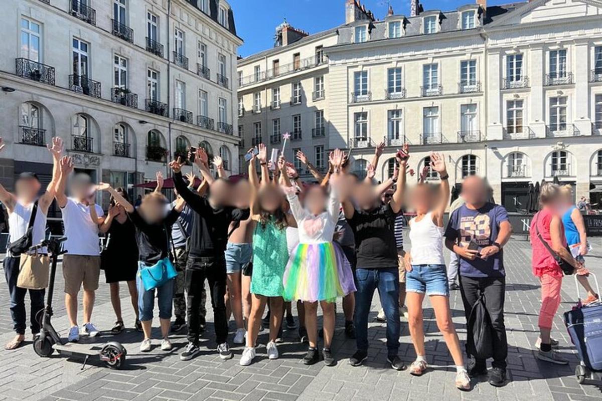 a group of people standing in a street with their hands in the air