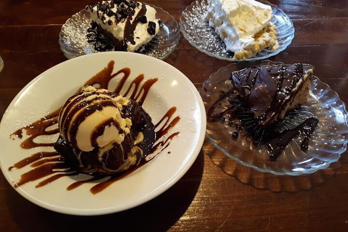 a table topped with different types of desserts on plates