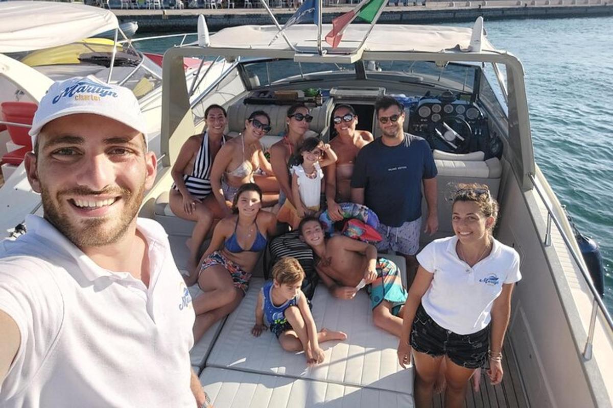 a group of people sitting on a boat