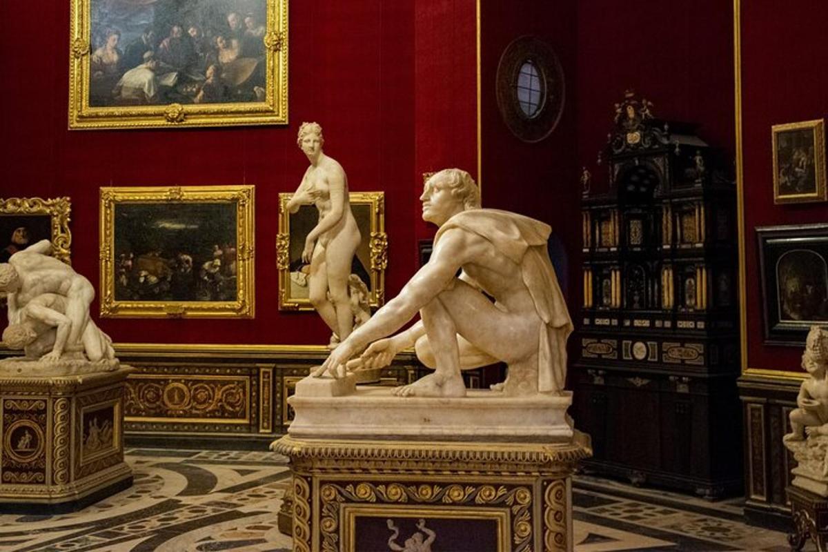 a room with a statue in a museum