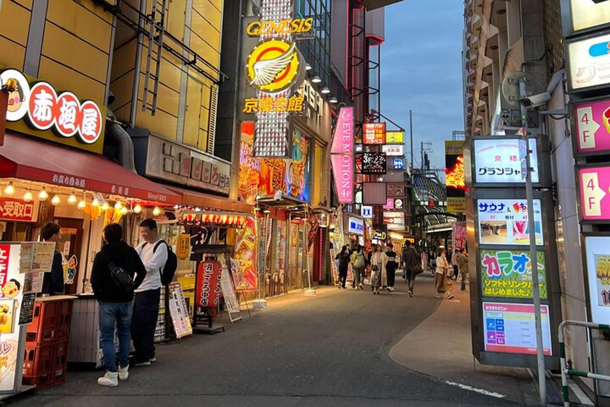 a group of people walking down a city street with signs