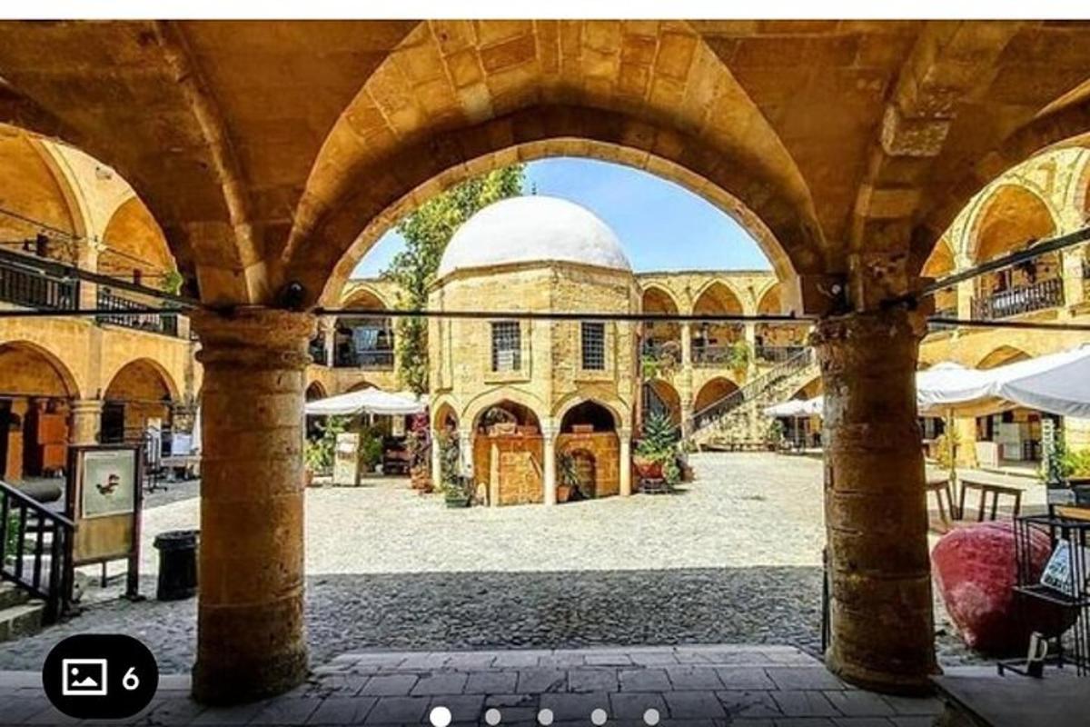 a view of a mosque through an archway