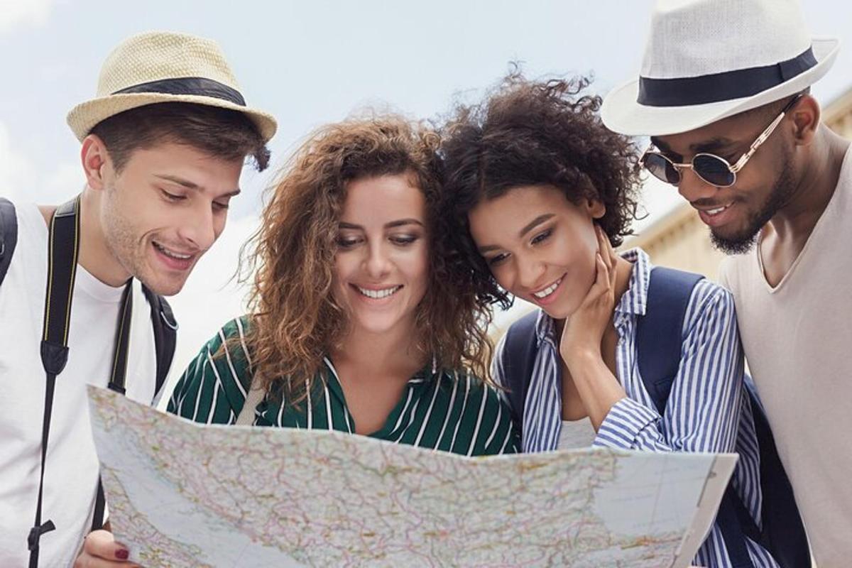 a group of people looking at a map