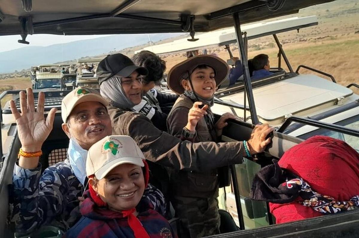 a group of people riding in a vehicle