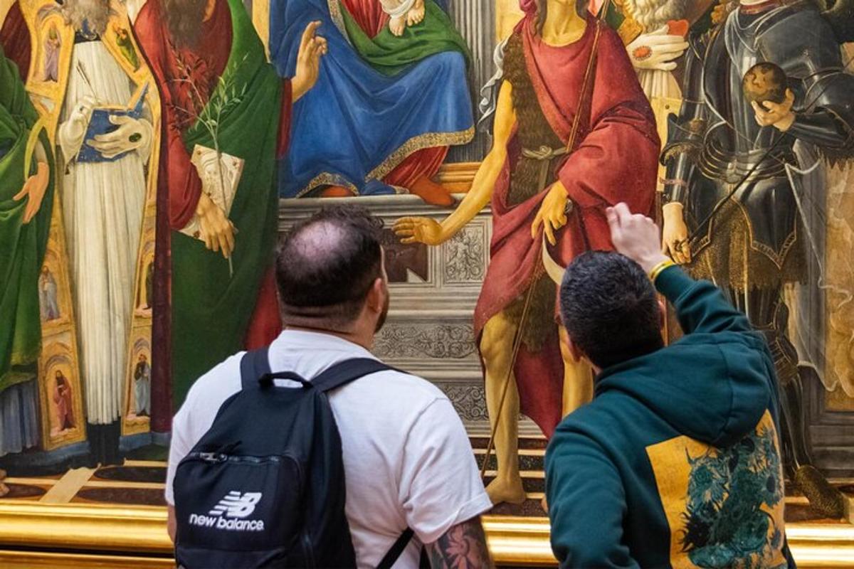 grupp inimesi, kes vaatavad maali