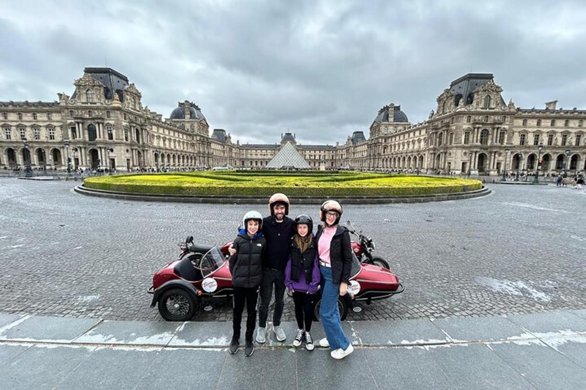 a group of people posing in front of a building