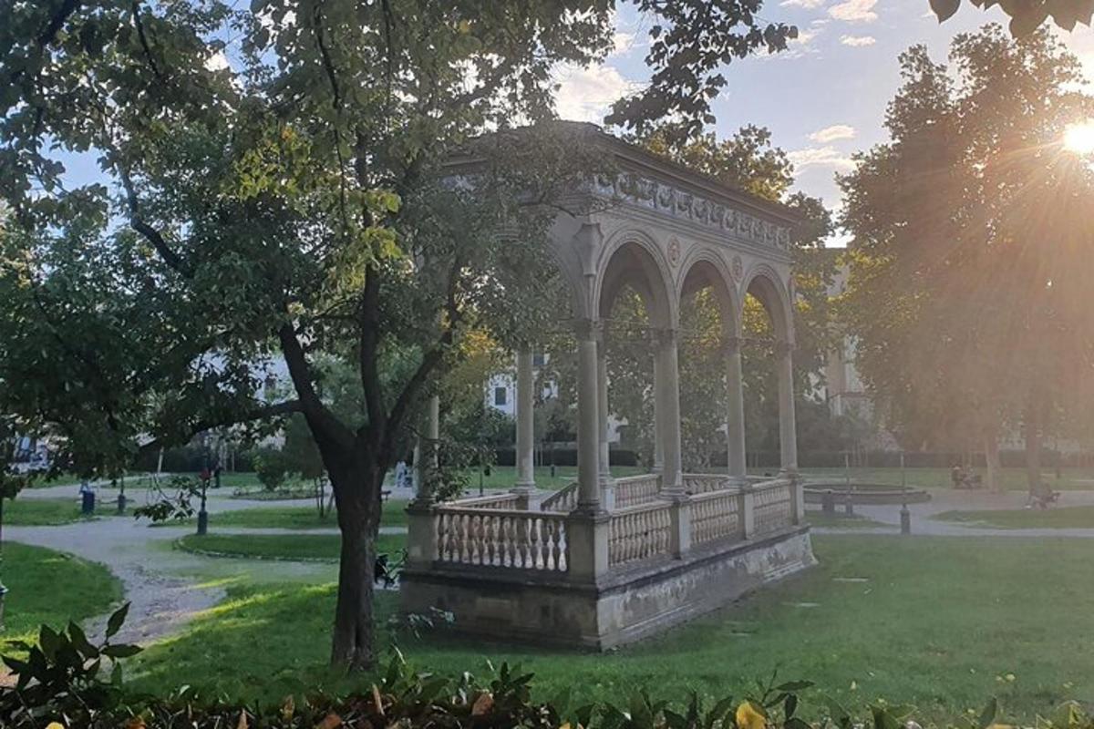 a gazebo in the middle of a park