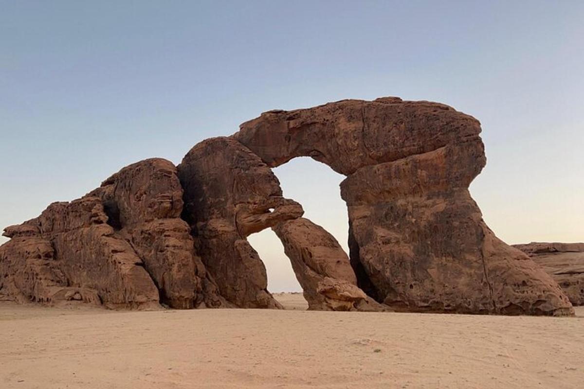 an arch in a rock formation in the desert