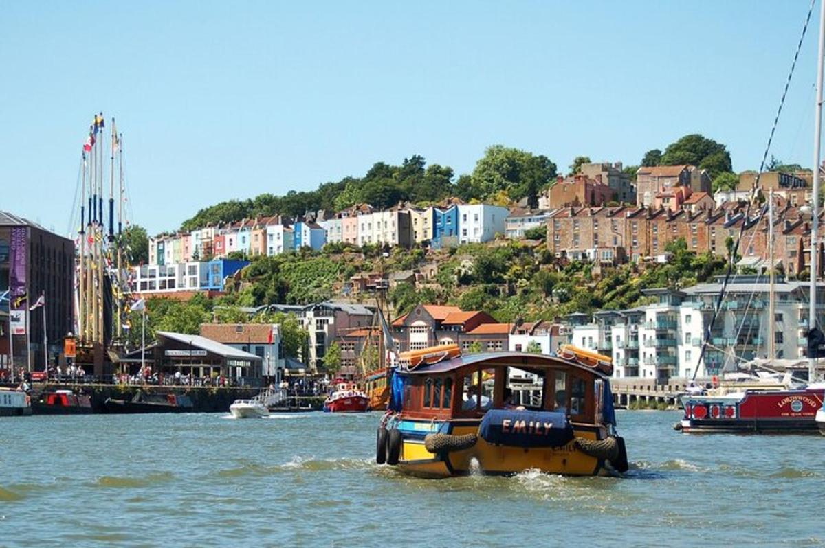 a small boat in the water in a city