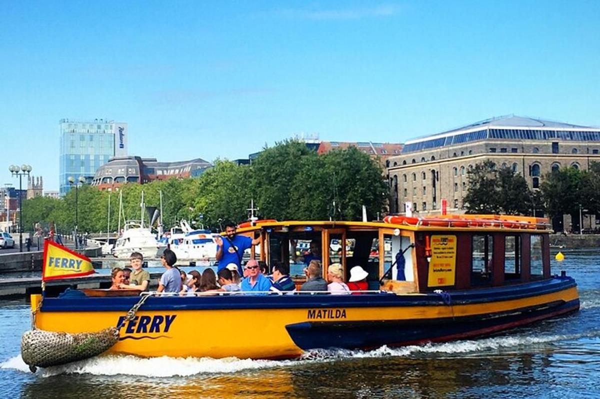 a group of people on a boat in the water