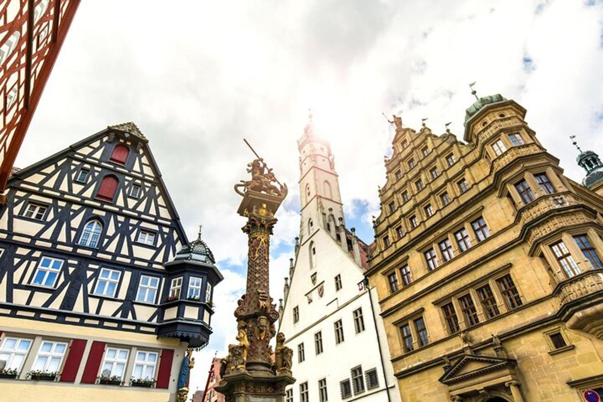a city street with buildings and a clock tower