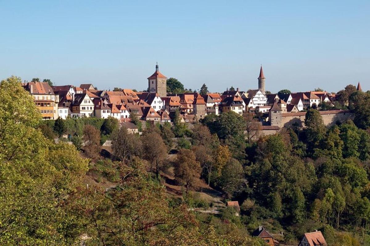 a town on top of a hill with houses