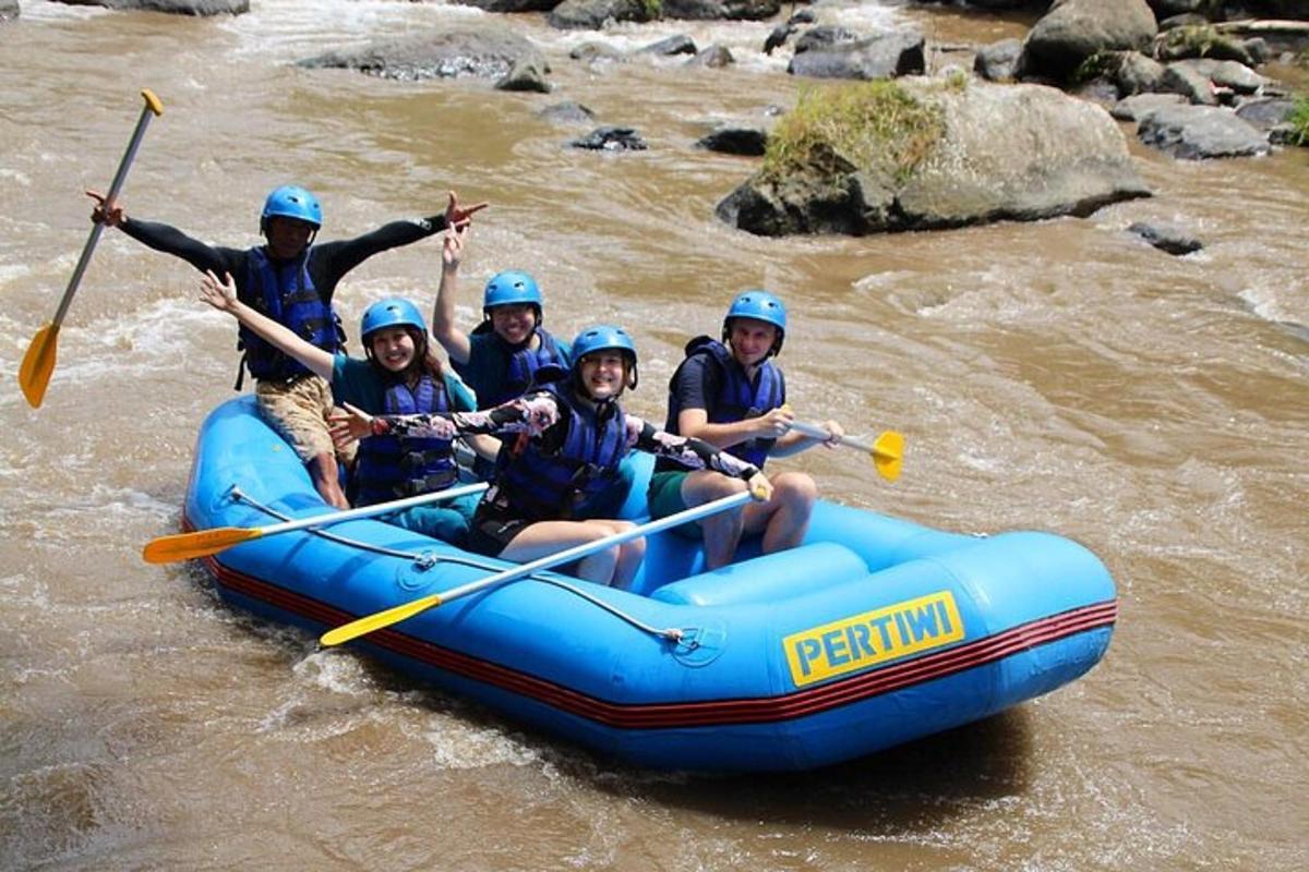a group of people in a raft on a river