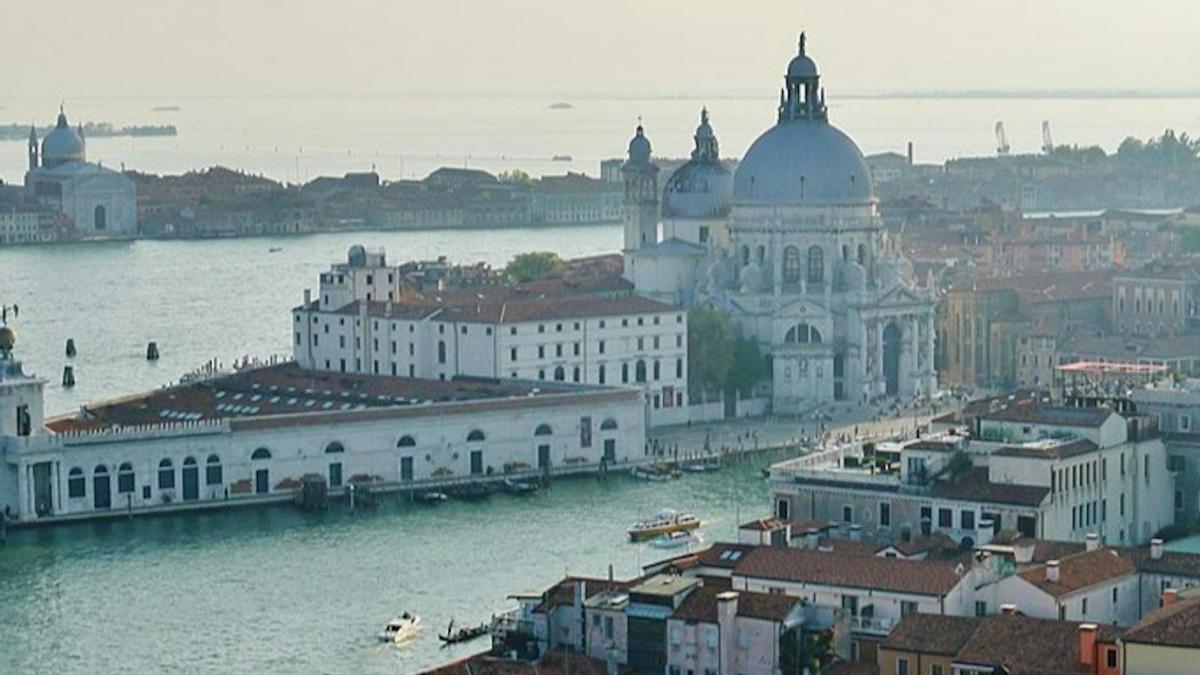 a view of a city with a river and buildings