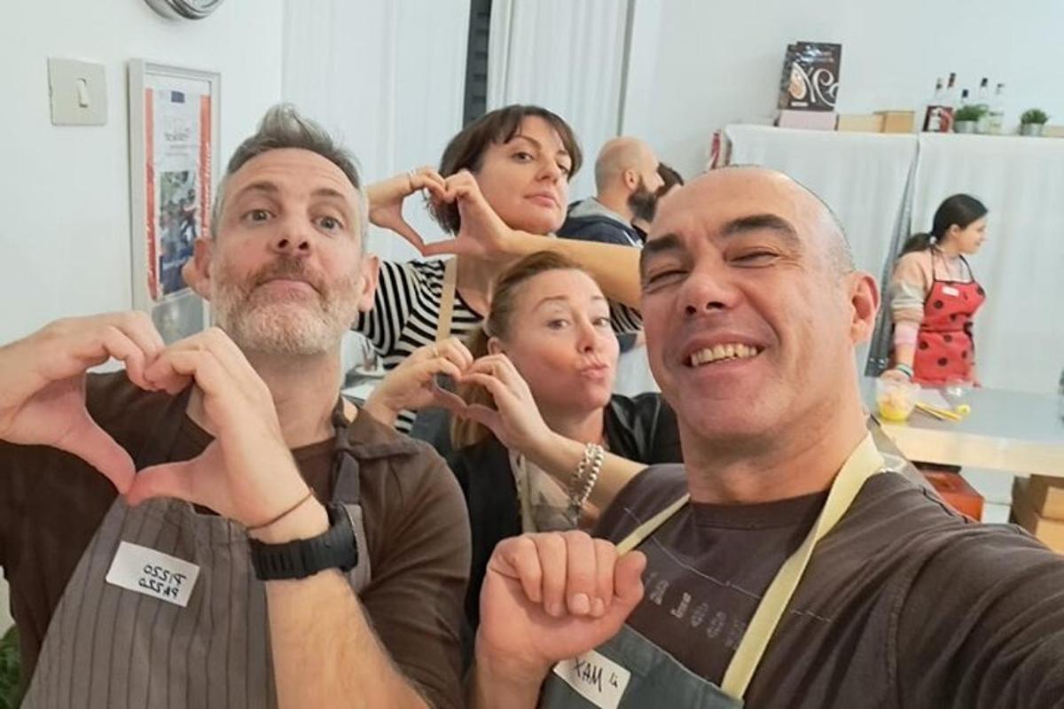 a group of people making a heart with their hands