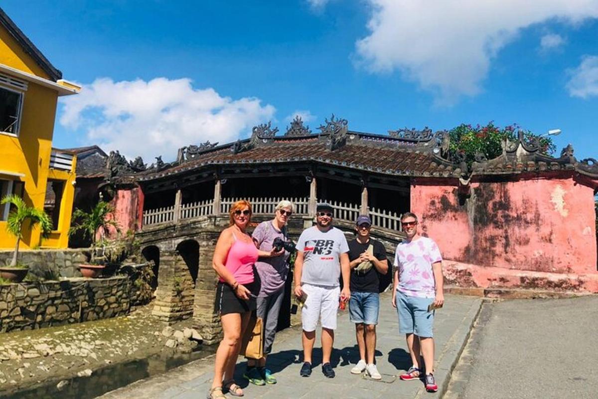 a group of people standing in front of a building